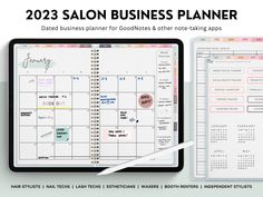 a planner with the words salon business planner on it and a pen next to it