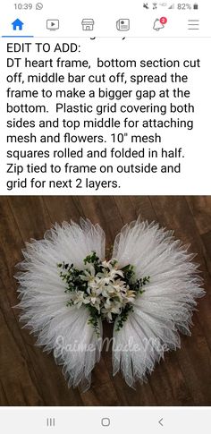 a white flower arrangement on top of a wooden floor next to a text message that reads, edit to add