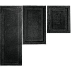 three black bathroom rugs with one door open and the other closed, on a white background