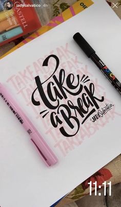 a notepad with a pen on top of it that says take a break