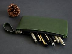 ❤Personalized Leather Pencil Case • Perfect gift for professionals and students • Organize business cards, pen and Pencil • Student-specific custom small pencil case • Made with premium full Vegan leather • Not include papers and pens ✦Materials:Vegan Leather ✦Color:Green ✦Size: 19.7*10*1.5cm ✦Weight: 0.05kg 🌸WE CAN CUSTOMIZE FOR LEFT-HANDERS: Please place an order and leave us a message, no additional customization fee is required. 🌻 About Customization: ✔Name or initials • Default position: bottom right corner • Default font name: Arial • Default font color: No color (darker than leather) ✔Logo • Default position: front center • Logo can be only engraved in the color like the leather. • Please tell us your custom information in the "Personalisation" text box on the shopping page. • Ple Rectangular Office Pencil Case With Pen Holders, Business Pencil Case With Pen Slots, Classic Pencil Case With Pen Slots, Classic Pencil Case For Daily Use, Classic Pencil Case With Pen Slots For Personal Use, Green Pencil Case With Pen Slots For Daily Use, Classic Pencil Case With Pen Slots For Daily Use, Organize Business, Small Pencil Case