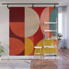 an abstract wall mural in a living room