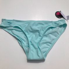 No Boundaries Light Teal Bikini Bottoms. Bikini Cut Bottoms. On The Front Of The Hips It Has A Laced Up Criss Cross Look. (See Pictures) Smoke Free Home!! Light Teal, No Boundaries, Blue Gray, Criss Cross, Boundaries, Womens Swim, Color Blue, Blue