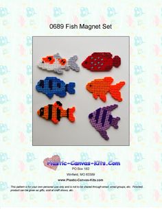 four fish magnets are shown in different colors