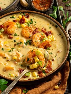 a bowl of shrimp chowee with corn and garnish