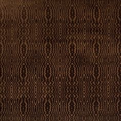 a brown and black pattern on fabric