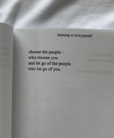 an open book with the words learning to love yourself