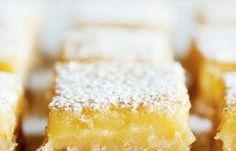 several pieces of cake with powdered sugar on top