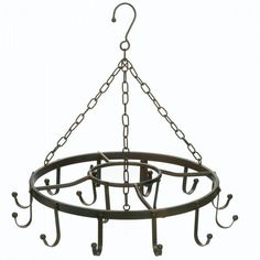 a metal circular hanging pot rack with hooks