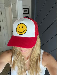 Adorable and so much fun!! This Smiley Face Vintage Trucker hat sits high for that cool Cali surfer vibe. Fully adjustable, foam backing with cotton front, trucker style with a mesh back. Perfect for the beach, sun, or just a bad hair day. Get ready for Summer!! Adjustable Baseball Cap With Smiley Face, Fun Red Trucker Hat For Beach, Casual Smiley Face Snapback Hat, Adjustable Smiley Face Cap, Trendy Smiley Face Cap, Fun Red Trucker Hat, Trendy Smiley Face Baseball Cap, Fun Snapback Trucker Hat, Casual Trucker Hat With Smiley Face