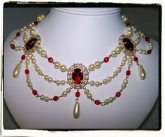 Ruby and Pearl Collar Renaissance Tudor Necklace Game of Elegant Red Pearl Jewelry, Elegant Red Pearl Necklace For Weddings, Elegant Red Pearl Necklace For Formal Occasions, Red Elegant Pearl Drop Necklace, Elegant Red Pearl Drop Necklace, Elegant Red Bridal Necklace With Round Beads, Elegant Red Beaded Bridal Necklace, Elegant Red Jeweled Bridal Necklace, Elegant Jeweled Red Bridal Necklace