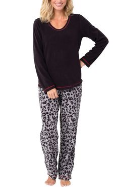 PRICES MAY VARY. Warm Fleece Two-Piece PJ – Destined to be your favorite pajamas, our cozy lightweight fleece two-piece pj set includes printed pants and a solid coordinating long-sleeve top with contrast stitching; Choose from two pj styles: straight leg pants with an elastic drawstring waistband and a v-neck top, or jogger style pants with an elastic waist and relaxed fit crew neck top with bottom drawstring to keep the chill out Array of Colors & Prints – Made from ultra-soft, lightweight fle