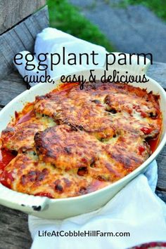 an eggplant parm casserole is shown in a white dish on a picnic table