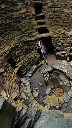 the inside of an old stone building with stairs