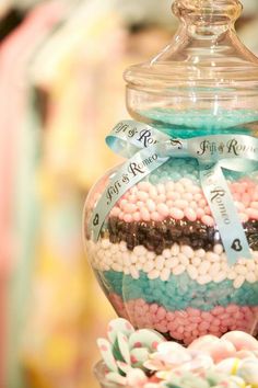 a glass jar filled with lots of candy