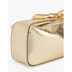 Find LANVIN Metallic Leather Clutch Bag on Editorialist. The Lanvin clutch bag is crafted from 100% calf leather and features a metallic finish. It has a zip top closure with a flap-over and toggle-clasp, one main compartment, and a detachable strap. The clutch bag measures 9cm in height, 20cm in width, and 7cm in depth. The strap drop is 43cm. Specialist leather clean. Comes with a dust bag. Designer Leather Clutch In Rectangular Case, Formal Rectangular Clutch With Palladium Hardware, Chic Leather Clutch In Rectangular Case, Chic Rectangular Clutch With Palladium Hardware, Chic Leather Clutch Rectangular Case, Leather Top Handle Clutch For Party, Chic Leather Rectangular Clutch, Gold Leather Evening Bag, Designer Gold Leather Evening Bag