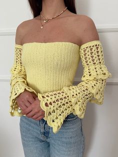 100% handmade crochet top with lovely long sleeves.  YARN: 100% cotton yarn SIZE: XS-S arm circumference 23-27cm (stretchy sleeves) Bust circumference 70-85 Waist circumference 62-75 M arm circumference 25-30cm (stretchy sleeves) Bust circumference 80-95 Waist circumference 72-85 MEASUREMENTS: Before buying, measure your bust, waist and arm circumference to make sure that the chosen size fits you. Lenght of top: ~23,5cm Lenght of sleeve: ~51,5cm  Sleeves have a sewn-in elastic band Spring Crochet Dress With Long Lace Sleeves, Hand Knitted Long Sleeve Crochet Top For Spring, Summer Long Sleeve Crochet Top, Fitted Crochet Top With Lace Long Sleeves, Cotton Tops With Crochet Trim And Long Sleeves, Cotton Top With Crochet Trim And Long Sleeves, Fitted Crochet Dress With Lace Long Sleeves, Fitted Long Sleeve Crochet Top For Summer, Spring Long Sleeve Crochet Dress With Crochet Trim