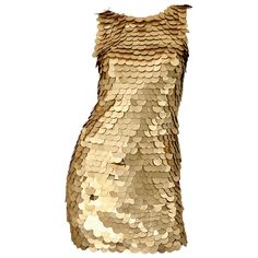 Sexy vintage 90s CD GREENE for BERGDORF GOODMAN gold pailettes sequin bodycon mini dress! Features thousands of hand-sewn matte gold pailettes throghought the entire dress. Simply slips over the head and stretches to fit. A definite statement maker that has a very Tina Turner feel. The perfect alternative to a little black dress. Great with heels or boots. Very well made with heavy attention to detail. Made in Italy In good condition Approximately Size Medium (lots of stretch) Measurements: 34-3 Vintage Bodycon Dress, 1940s Wedding Dress, Vintage Bob, Gold Sequin Dress, Designer Evening Gowns, Tina Turner, Bob Mackie, Silk Taffeta, Strapless Gown