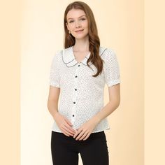 This vintage shirt with a Peter Pan collar and polka dot design adds to the beauty and charm of a woman. Polka dots and a Peter Pan collar bring casual romance to this puff-sleeve shirt. Suitable for daily casual, weekend gatherings, dating, office, and work. It is perfectly paired with jeans or skirts for a retro and chic look. A puff sleeve and embroidered decor add ebullient charm to this polka-dot top. Puff sleeves instantly elevate this retro shirt and make it a sophisticated choice for day Classic Fitted Polka Dot Blouse, Fitted Tops With Cute Collar For Work, Polka Dot Collared Summer Tops, Summer Polka Dot Collared Tops, Spring Polka Dot Blouse With Collar, Classic Fitted Polka Dot Tops, Polka Dot Short Sleeve Blouse For Work, Polka Dot Collared Blouse For Work, Retro Polka Dot Short Sleeve Blouse