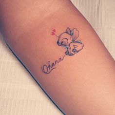 a small tattoo with the name ohana on it's left arm and an image of a koala