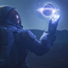 a man in an astronaut's space suit holds up a glowing object to the sky