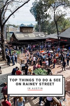 Once a sleepy residential area, the Rainey Street district has become an entertainment hot spot of bungalows-turned-bars, high-end hotels and live music venues in a tucked-away corner of Downtown Austin. Find out where to go and what to do on this street that never sleeps. Image shows large crowd dancing and enjoying the patio at Banger's Sausage House and Beer Garden. Here you can choose from over 200 beers on draft to go with a juicy sausage or plate of whole hog barbecue. Rainey Street Austin, Visiting Austin Texas, Historic Bungalow, Downtown Austin Texas, Texas Adventure, Visit Austin