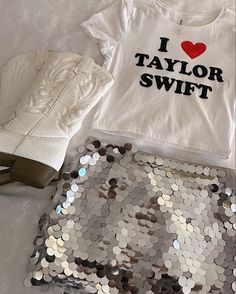 i love taylor swift t - shirt and sequins purse on white bedding