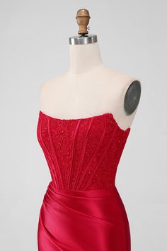 a red evening dress on a mannequin