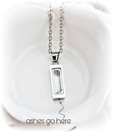 "Bar Cremation Necklace- Locket Necklace Rectangle Urn Vial Clear Glass Cremation Jewelry Memorial Ring Child Loss Ring -Mom Memorial Jewelry The bar cremation necklace has a small screw at the bottom of the bar so you can fill it with your loved one's ashes. This necklace is stainless steel and will never tarnish or turn your skin green. The chain is 18\". The ashes can move around freely or you can fill it completely so they do not move. The ashes can be seen from the outside through a clear g Everyday Stainless Steel Rectangular Jewelry, Everyday Rectangular Stainless Steel Jewelry, Rectangular Metal Jewelry For Gift, Personalized Rectangular Jewelry For Memorial, Adjustable Oblong Jewelry As A Gift, Adjustable Rectangular Jewelry Gift, Adjustable Rectangular Jewelry For Gifts, Rectangular Silver Necklace For Mother's Day, Personalized Rectangular Metal Jewelry