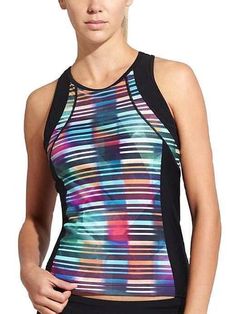 Athleta Multi Streamline Tri Tank Top Multi-Color Size XXS NEW WITH TAGS Athleta's resident lap swimmer set out to design the ultimate suit with the perfect, stay-put fit while flattering your form (consider it done). Nylon/Spandex LYCRA® XTRA LIFE™ SPANDEX. Ultra-resilient fabric snaps back like a pro and lasts 5-10x longer RATED UPF 50+ (Excellent Protection) Breathable, sleek, stretchy Imported Hand wash. Performance-fitted Hugs your body for a performance edge INSPIRED FOR: triathlon, perfor Multicolor Sleeveless Sports Top, Multicolor Racerback Activewear For Sports, Sporty Multicolor Racerback Top, Multicolor Athleisure Tops For Gym, Multicolor Athleisure Tops For The Gym, Multicolor Casual Activewear For Running, Casual Multicolor Activewear For Running, Multicolor Moisture-wicking Racerback Activewear, Multicolor Racerback Athleisure Activewear