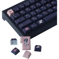 an image of a computer keyboard with keys and magnets on the back side,