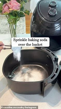 someone is baking something in a pot on the counter