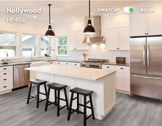 a kitchen with an island and three stools in front of the stove top oven