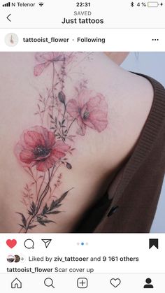 the back of a woman's shoulder with red flowers on it and text that reads, just tattoos