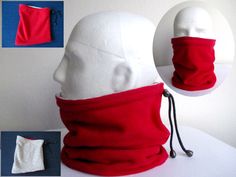 a white mannequin head wearing a red neck gaiter