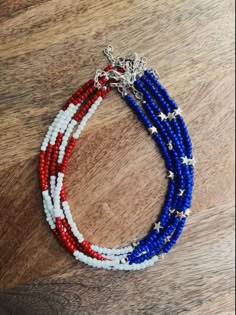 Red White And Blue Jewelry Diy, Red White And Blue Necklace, Red White And Blue Jewelry, Adjustable Colorful Beaded Jewelry For 4th Of July, Red Patriotic Necklace For 4th Of July, Adjustable Patriotic Red Necklace, Patriotic Blue Jewelry With Colorful Beads, Patriotic Blue Round Bead Jewelry, Patriotic Blue Beaded Necklaces