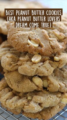 a pile of cookies sitting on top of a cooling rack