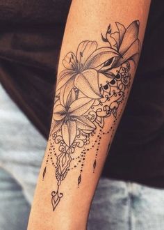 a person with a tattoo on their arm