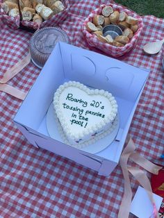 a heart shaped cake sitting on top of a table