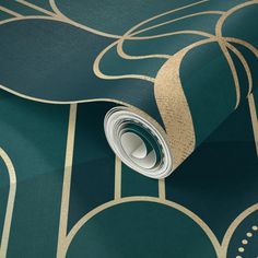 a green and gold wallpaper with an abstract design