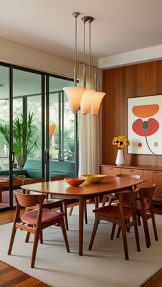 a dining room with wooden furniture and large windows