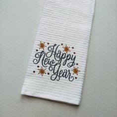 a towel with the words happy new year written on it