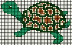 a cross - stitch turtle is shown in green and brown