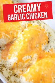 creamy garlic chicken in a white casserole dish with a red sign that says creamy garlic chicken