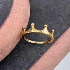 14K Solid Gold King Crown Ring ✨👑 Product Features Weight: 1.35 Gr ⚖️ Material Color: Yellow Gold, Rose Gold, and White Gold 🌈 Presentation: Shipped with a special box and bag 🎁 Returns: Right to return within 7 days 🔄 Material and Color: Product color does not fade or darken ✨ Handcraftsmanship and Uniqueness: Handcrafted and may vary by 5% (+-) 🛠️ Product Description Embrace regal elegance with the 14K Solid Gold King Crown Ring. This exquisite ring, weighing 1.35 grams, is available in three stunning colors: Yellow Gold, Rose Gold, and White Gold, offering a choice to match your personal style 🌈. Crafted with meticulous attention to detail, the King Crown design symbolizes power and majesty. Each piece is handcrafted, ensuring unique characteristics with a slight variation of 5% ( Rose Gold Crown Design Ring As Gift, Adjustable Crown Design Wedding Rings, Crown Design Open Ring Jewelry Gift, Rose Gold Ring With Crown Design, Gold Ring With Crown Design, Classic Crown Design Promise Ring, Classic Crown Promise Ring, Classic Crown Shaped Promise Ring, Gold Ring With Crown Design For Anniversary