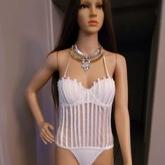 Sexy White Bodysuit Flirty Fitted Beach Bodysuit, Flirty Fitted Bodysuit For Beach, Fitted Flirty Beach Bodysuit, White Underwire Bodysuit For Party, Chic Underwire Bodysuit For Party, Stretch Party Corset With Lined Body, Summer Night Out Corset With Lined Body, Summer Corset For Night Out With Lined Body, Stretch Corset With Lined Body For Party