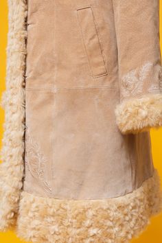 "Follow our Instagram for updates @fantasia_superstar FB: https://www.facebook.com/fantasiasuperstar We're open to reasonable offers ♡ Amazing 60s 70s inspired beige suede leather & faux fur coat ⫸ Super rare and beautiful ❀ Penny Lane ❀ It's really gorgeous!! ⫸ Condition: Beautiful vintage pre-loved condition. Without any odors. Some teeny-tiny marks on the leather but REALLY nothing noticeable. Please see the pictures <3 ⫸ Lined with soft silky polyester ⫸ Amazing floral embroidery on f Beige Winter Outerwear For Festivals, Fitted Beige Outerwear For Festivals, We're Open, Beige Coat, Penny Lane, 1970s Fashion, Dec 30, 70s Inspired, Faux Fur Coat