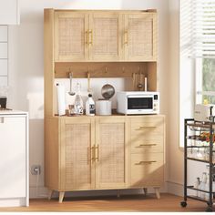 a kitchen area with a microwave, toaster and cabinets