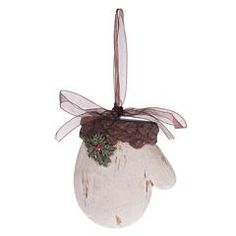 an ornament hanging from the side of a white ball with a bow on it