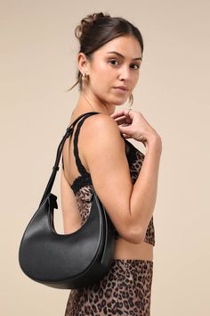 The Lulus Precise Style Black Crescent Shoulder Bag is a must-have for creating looks that effortlessly express your chic sense of style! Smooth faux leather shapes this essential accessory that boasts a crescent-style silhouette with a flat bottom design and an adjustable shoulder strap. The zippered top opens to reveal a lined interior with a sidewall pouch and an additional zipper pocket. From every day wear or weekend activities, this purse is perfect for any activity! Lined. Bag Measures 9. Elegant Faux Leather Baguette Bag With Zipper Closure, Chic Faux Leather Hobo Bag With Zipper Closure, Chic Hobo Bag For Night Out, Chic Faux Leather Baguette Shoulder Bag, Chic Black Faux Leather Baguette Bag, Chic Shoulder Bag With Zipper For Night Out, Chic Shoulder Hobo Bag For Night Out, Chic Hobo Shoulder Bag For Night Out, Chic Faux Leather Baguette Bag For Everyday Use